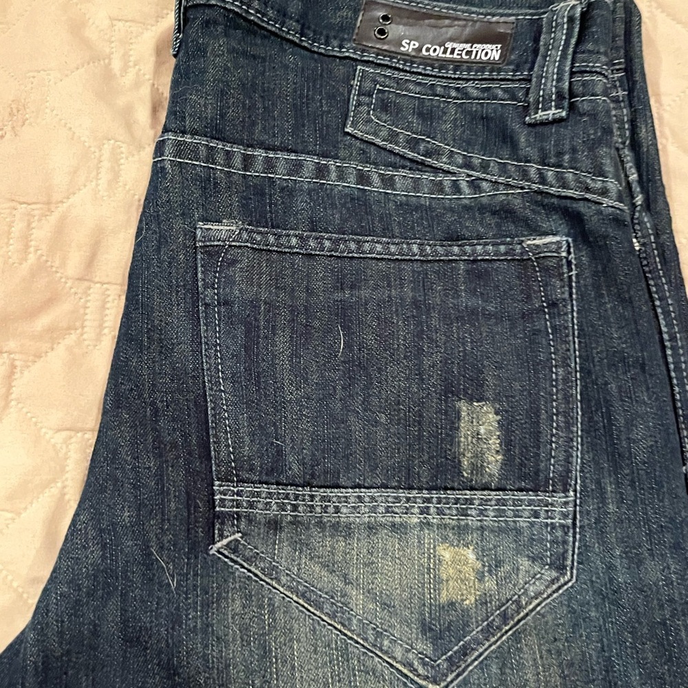 Blue Straight Jeans with Distressed Details